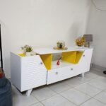Modern White TV Stand with Yellow Accents
